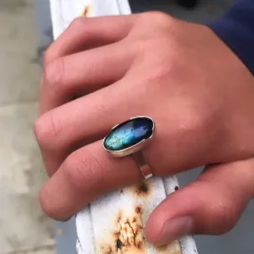 Oval cut out ring in labradorite